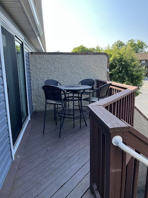 Outside deck with table and chair set 