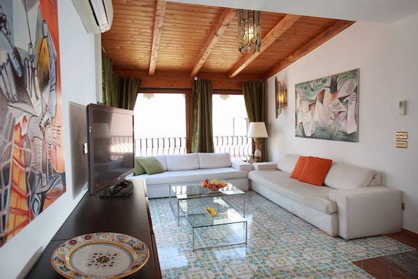 Living room with views on old town of Taormina and Mt Etna