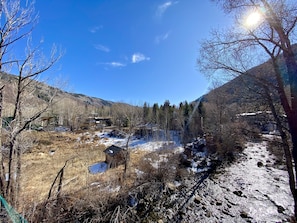View from deck of the Roaring Fork River, Independence Pass and Aspen Mountain 