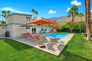 Backyard, pool and house facing South West towards San Jacinto Mountains
