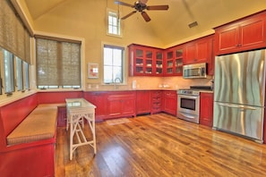 Full kitchen with stainless steel appliances