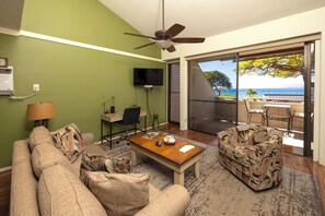 Living room with vaulted ceilings and open floor plan and stunning ocean views! 