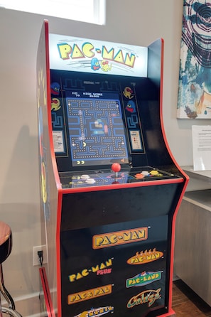 40th Anniversary Edition Arcade Galaga and Pac Man Game, plus 7 other games.