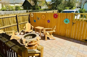 Private Back yard with Firepit, BBQ, Outdoor area and covered deck with dining