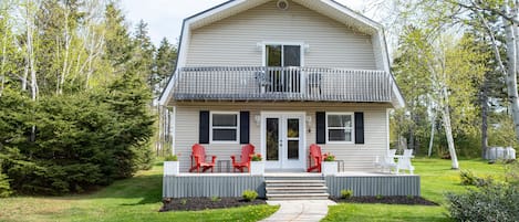 Enjoy the southern exposure deck on the Adirondack chairs and bench