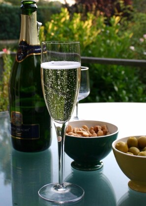 Enjoy a glass of bubbles in our Courtyard garden (pretty solar lights light up)