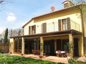 South facade with garden, patio and terrace