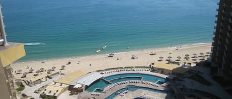 Looking down on pool area and beach