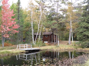 View of Fisherman's Cove cabin from Middle Gresham Lake