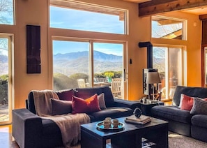 Views of the mountains can be seen from every room of this modern interpretation of a cabin.
Gas log stove, comfortable furnishings, HDTV with house accounts, Mini Nintendo game system, DVD player books by local authors, and cookbooks.