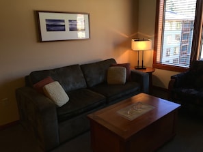 Living Room with Queen Sleeper Sofa and Memory Foam Mattress