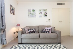 A comfy sofa to watch television late at night...