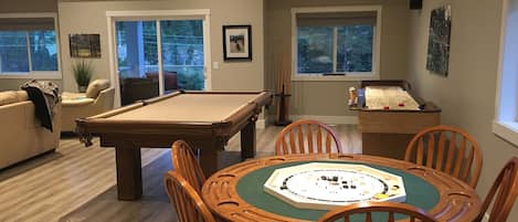 The room that has it all, pooltable, ping pong,shuffleboard, poker table, tv