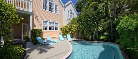 Enjoy the privacy of your own heated pool, surrounded by lush tropical greenery. 