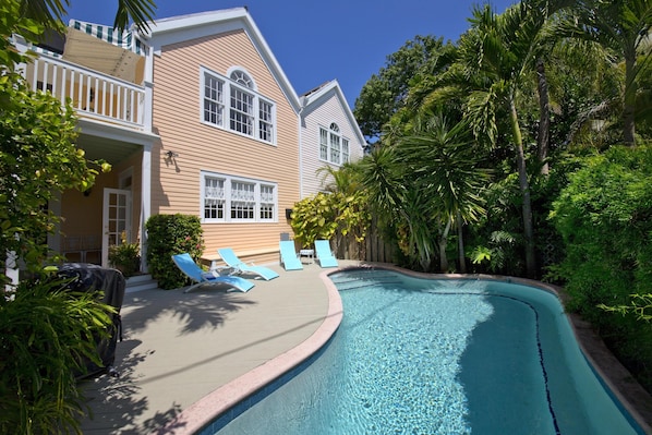 Enjoy the privacy of your own heated pool, surrounded by lush tropical greenery. 