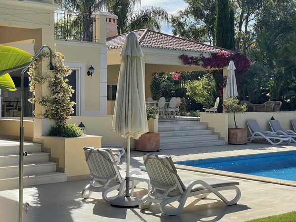 Beautiful sun terraces around large pool