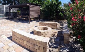 Toast marshmallows over the fire pit or enjoy a meal under the pergola!