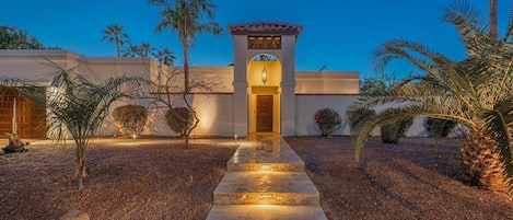 Elegant & Towering Spanish Style Home with serious curb appeal!