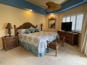 Spacious Master Bedroom with View, Overhead Fan & Large Flat Screen TV. 