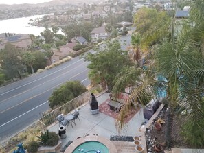 Northwestern view of Canyon Lake community, Vacation Drive, patio, grill, spa.