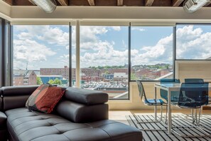 Cityscape views from living and dining areas.