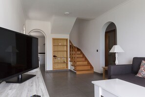 Living area with sofa bed and Flat Screen TV (Spanish, UK, German channels)