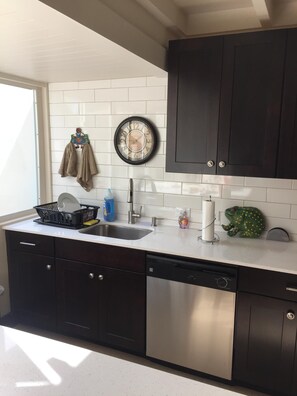 Sunny Kitchen with view of the courtyard