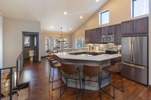 Contemporary kitchen with bar seating