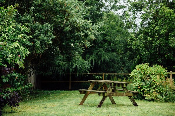 rear garden/barbecue and seating area