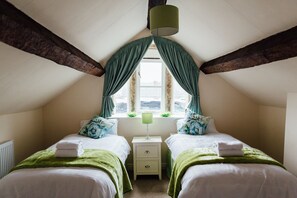 twin room with beamed ceiling on top floor