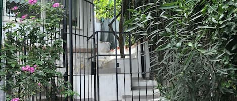 gate connecting terrace with private and exclusive garden