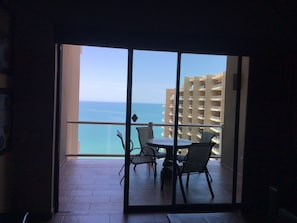 View of ocean thru patio door