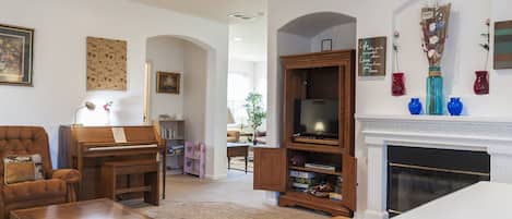 Family room.  Rare Pianola provides sounds resembling Romantic/Baroque music 