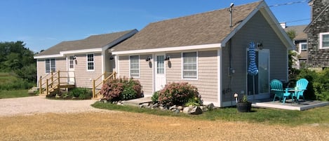 Cottage #3 at Salty Breeze Cottages is on the left, with connected laundry room