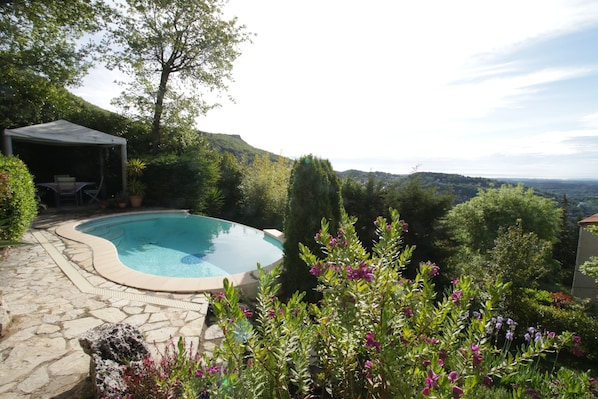 Pool with panoramic views of hills and sea