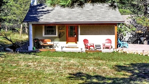 Cabin outside with elk (left of Cabin)