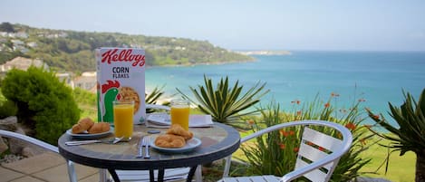 Breakfast on the sea terrace with views towards St Ives Harbour 