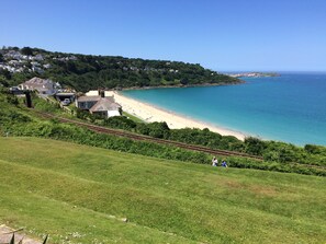 Views over Carbis Bay Beach and St Ives Harbour distant from the terrace