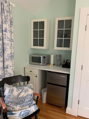 microwave, mini-fridge and freezer and coffee maker