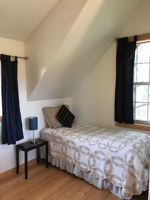 Twin bedroom with view of Denali