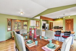 Make memories with friends and family hanging out in kitchen and dining area