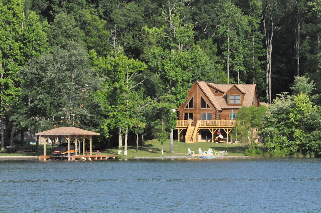 Captivating 5 Bed/5 Bath Lake Front Log Cabin W/ Private Cove & Sandy
