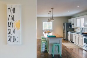 View into the kitchen from the open concept living room.