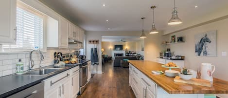 Open concept gourmet kitchen with all the essentials to inspire the chef in you.