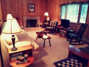 Living Room: fireplace, entertainment center, view of the Ottawa Nat'l Forest