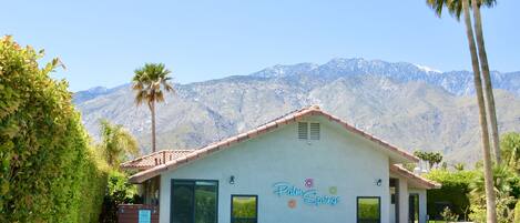 View of the pool with huge Palm Springs sign as beautiful photo background
