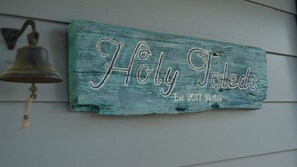 Sign on front of home