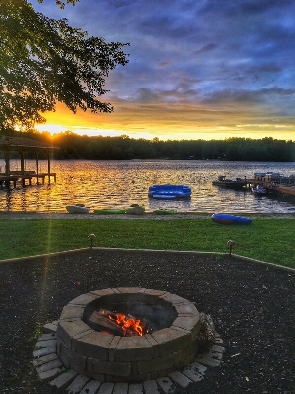 beautiful sunset over the water at the fire pit -float, boathouse not included 
