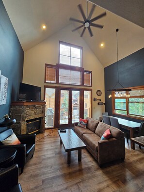 Large south-facing windows, high ceilings and open floor plan.