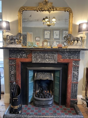 Stunning black & red marble fireplace in the formal drawing room. Coal fire.